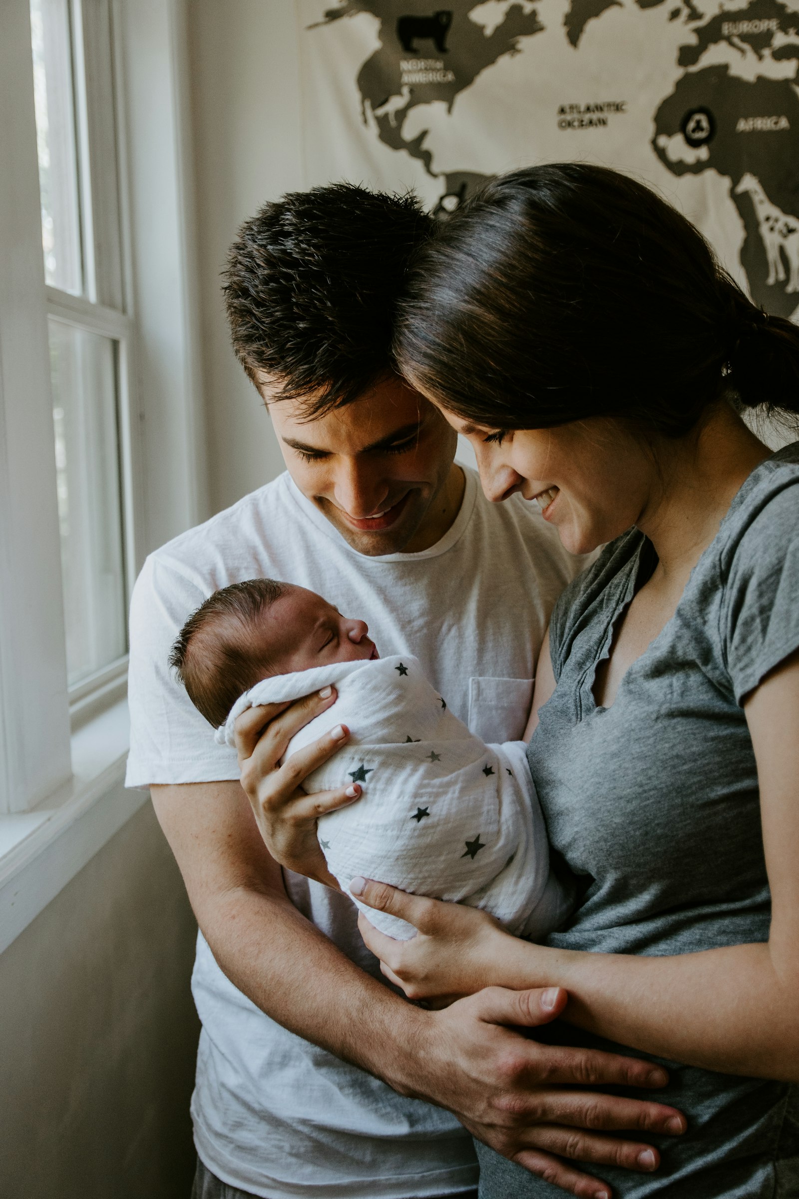 Parents holding their newborn baby